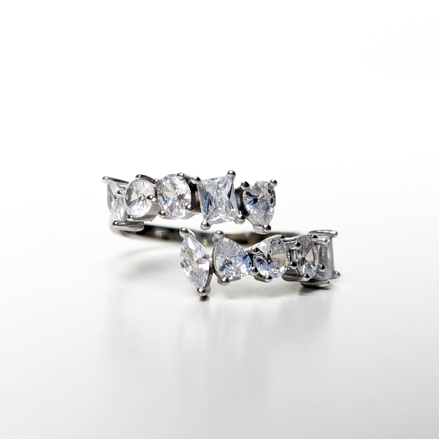 Lustrous Harmony Geometric Zircon Ring