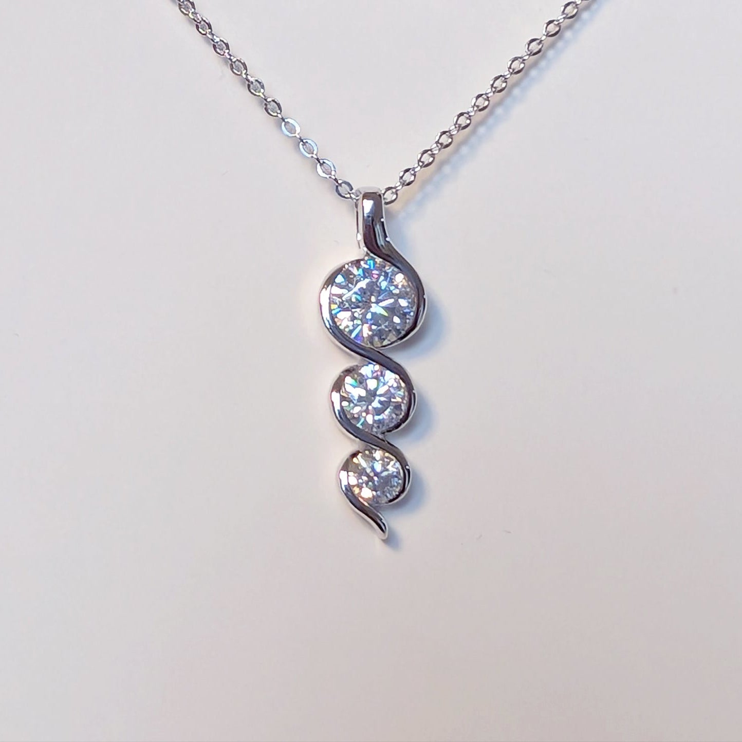 EternaTwist Moissanite Infinity Pendant